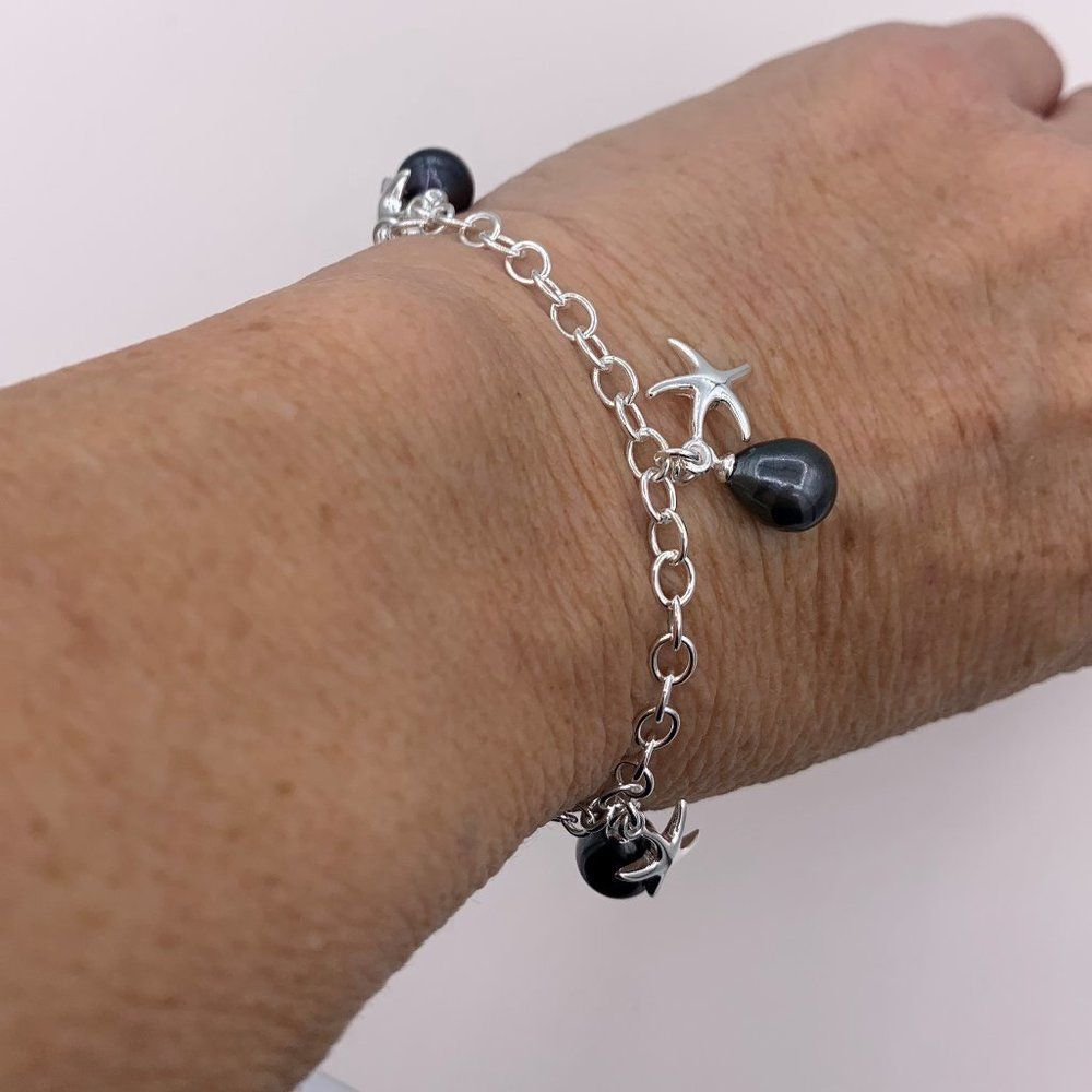 NWOT, 925 sterling silver charm bracelet, sterling starfish charms, real pearls